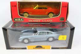 MIRA - CHRONO. 2 x 1:18 scale models appearing in Excellent condition with Excellent boxes.