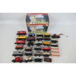 Hornby - A collection of unboxed OO gauge freight rolling stock (mainly tank wagons) with a boxed