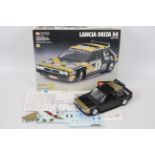 Bburago - Metal Kit. A boxed, party assembled 1/24 scale model kit for Lancia Delta S4 #5115.