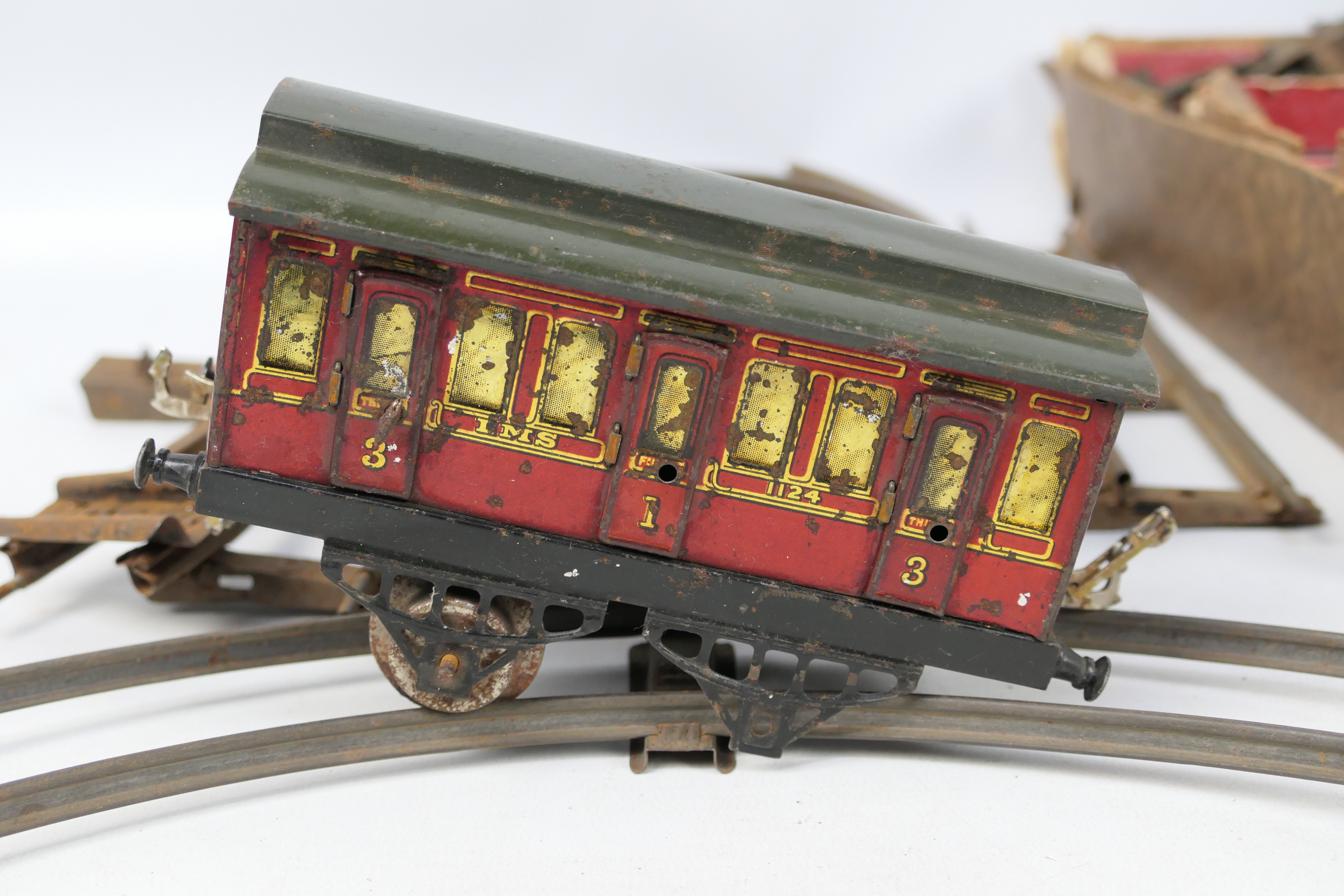 Hornby - A box of Hornby O gauge passenger coaches, tender plus a quantity of two rail track, - Image 3 of 5