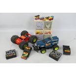 Tyco - Bigjigs - 2 x remote control trucks with chargers and a small wooden chest of drawers with a