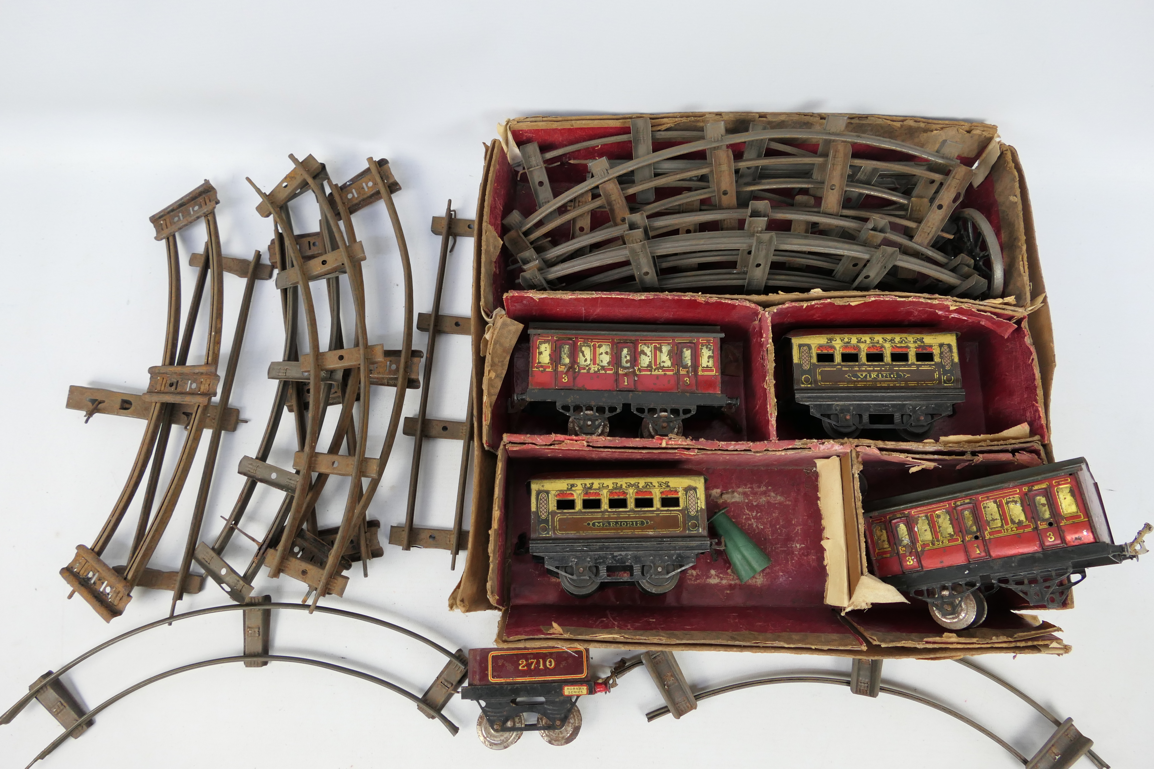 Hornby - A box of Hornby O gauge passenger coaches, tender plus a quantity of two rail track,