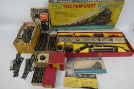 TTR Trix Twin - A boxed Trix Twin Cadet Railway set with 7 x additional boxed track sets and two