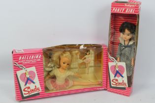 Pedigree - Sindy - 2 x boxed vintage Sindy dolls, Ballerina # 42000 and Party Girl # 44762.