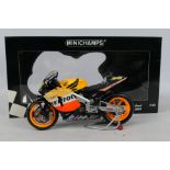 Minichamps - A boxed Valentino Rossi 2003 Honda RC211V Repsol Honda Team bike in 1:12 scale #