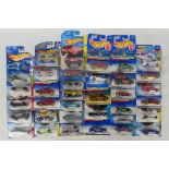 Hot Wheels - 33 carded and unopened Hot Wheels diecast vehicles on long and short cards from