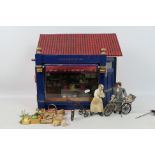 Dolls House - A scratch built wooden dolls house depicting a bakery shop entitled 'Kirsties'.