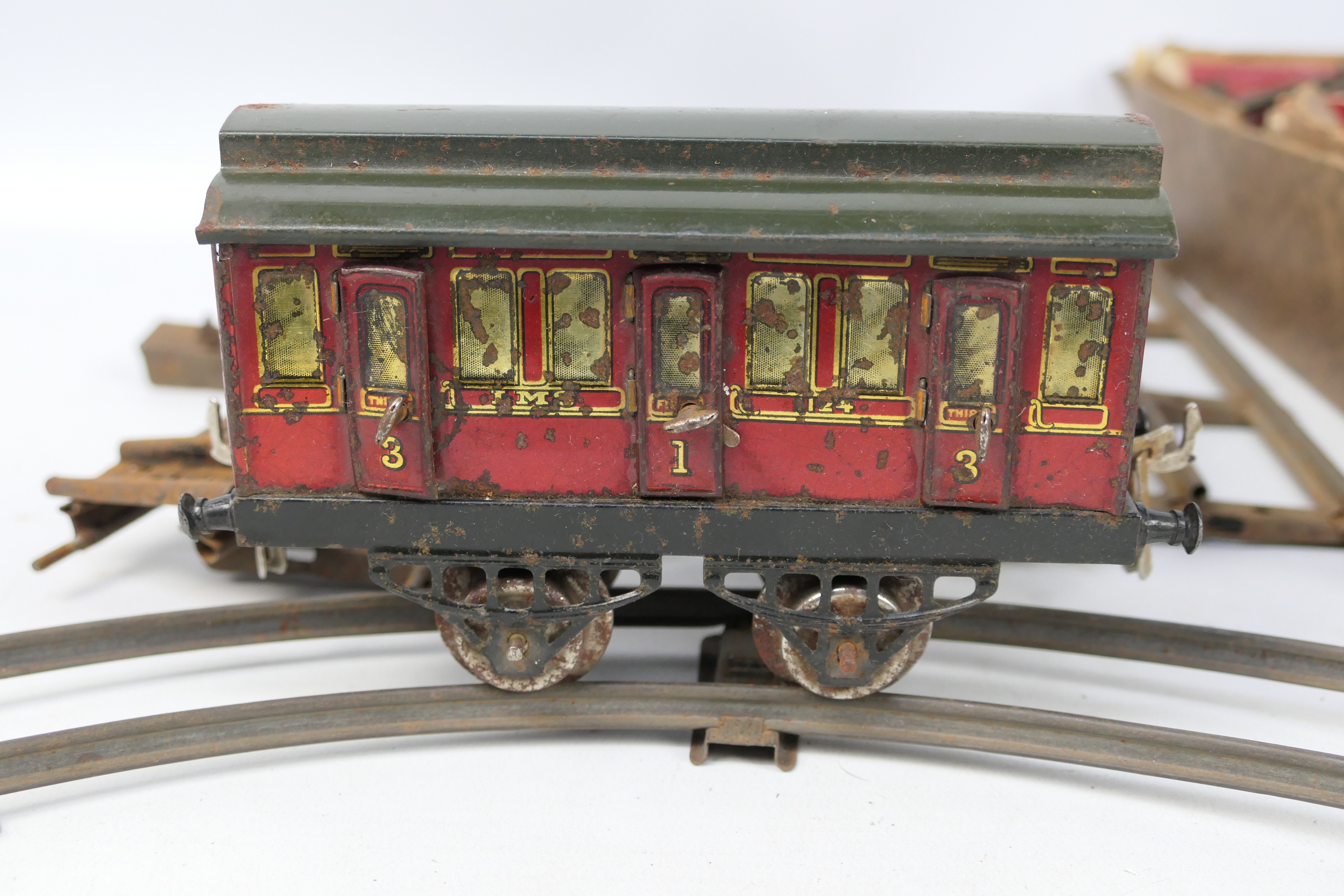 Hornby - A box of Hornby O gauge passenger coaches, tender plus a quantity of two rail track, - Image 4 of 5