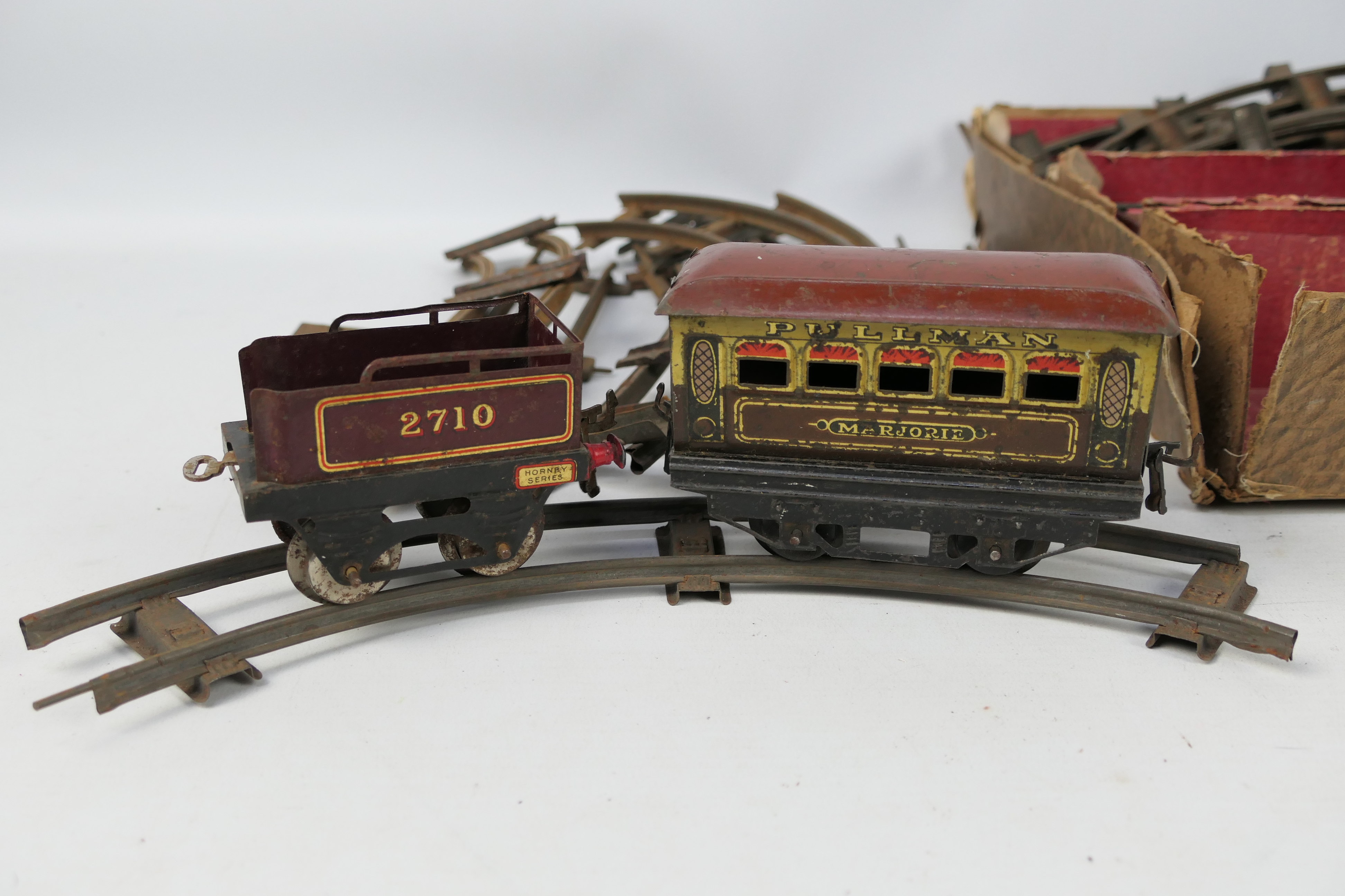 Hornby - A box of Hornby O gauge passenger coaches, tender plus a quantity of two rail track, - Image 2 of 5