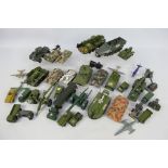 Dinky Toys - Corgi - Britains - Matchbox - Other - AN unboxed group of diecast military vehicles in