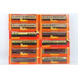 Hornby - A rake of 12 boxed OO gauge passenger coaches from Hornby.