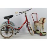 Raleigh - An unbranded vintage wooden push a long horse with a vintage Raleigh childrens trike.