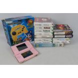Ninetendo - Sega - An unboxed pink Nintendo DS Lite, with 8 Nintendo Ds games,