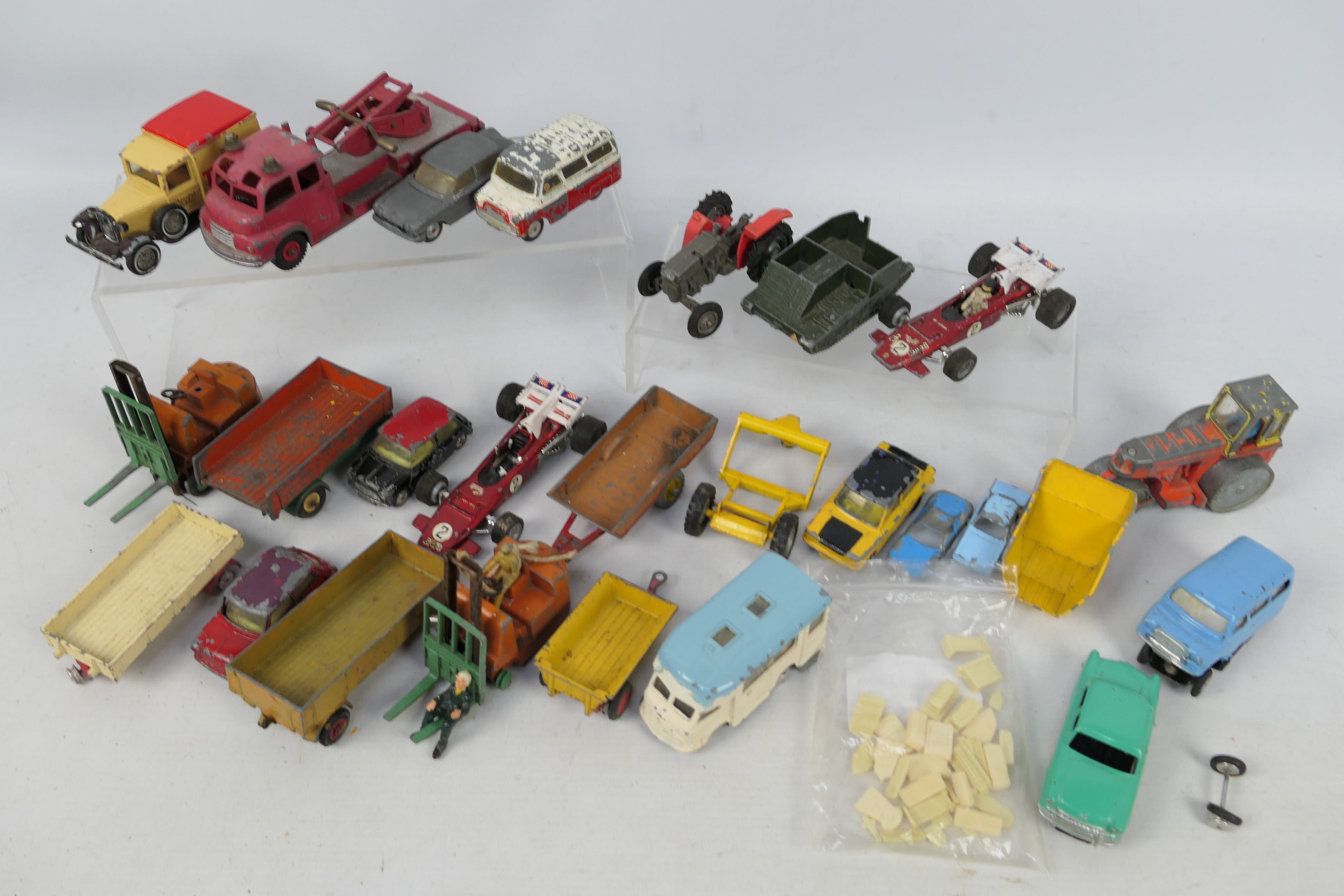 Dinky Toys - Corgi Toys - Matchbox - Marx - Others - An unboxed assembly of playworn diecast