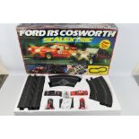 Scalextric - A boxed Ford Sierra RS Cosworth set # C575.