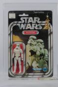 Kenner - Star Wars - Graded Figure - An AFA graded 1978 Kenner Stormtrooper figure on card,