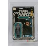 Kenner - Star Wars - Graded Figure - An AFA graded 1978 Kenner Death Squad Commander figure on card,