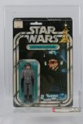 Kenner - Star Wars - Graded Figure - An AFA graded 1978 Kenner Death Squad Commander figure on card,