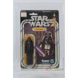 Kenner - Star Wars - Graded Figure - An AFA graded 1978 Kenner Darth Vader figure on card,