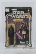 Kenner - Star Wars - Graded Figure - An AFA graded 1978 Kenner Darth Vader figure on card,