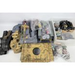 Heng Long - A collection of Battle Tank spare parts in 1:16 scale including bodies, tracks, motors,