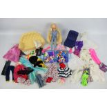 Pedigree - Sindy - An unboxed second generation Sindy doll with a collection of clothing and