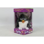 Hasbro - Tiger Electronics - A boxed model #70-800 Generation 1 1998 'Skunk' Electronic Furby by