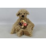 Teddy Hermann - "Monty" a Mohair Limited edition bear, number 240 of 2000.