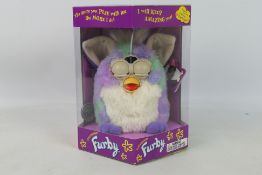 Hasbro - Tiger Electronics - A boxed model #70-800 Generation 4 1998 'Tie-Dye' Electronic Furby by