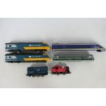 Hornby - Lima - Three unboxed OO gauge locomotives and two locomotive bodies.