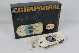 Cox - A boxed 1:24 scale Jim Hall Chaparral Sidewinder slot car # 14000:898.
