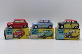 Corgi - 3 x boxed Mini models, Austin Seven in red # 225,