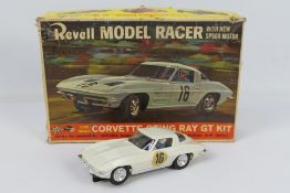 Revell - A boxed 1:32 scale Chevrolet Corvette Sting Ray GT slot car # R3102.