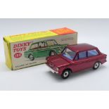 Dinky - Unsold Shop Stock - A boxed Hillman Imp Saloon # 138.