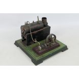 Bing - An unboxed vintage Bing live steam Single Cylinder Stationary Engine on a green metal base