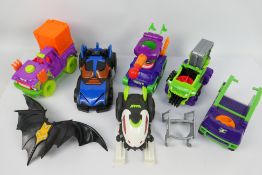 Mattel - Fisher Price - Imaginext - A small unboxed group of Super Hero themed children's toys.
