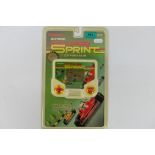 Tiger Electronics - An unopened 1990 Electronic Super Sprint hand held game # 7-833.