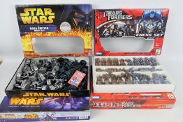 Hasbro - Star Wars - Transformers - Four boxed board games.