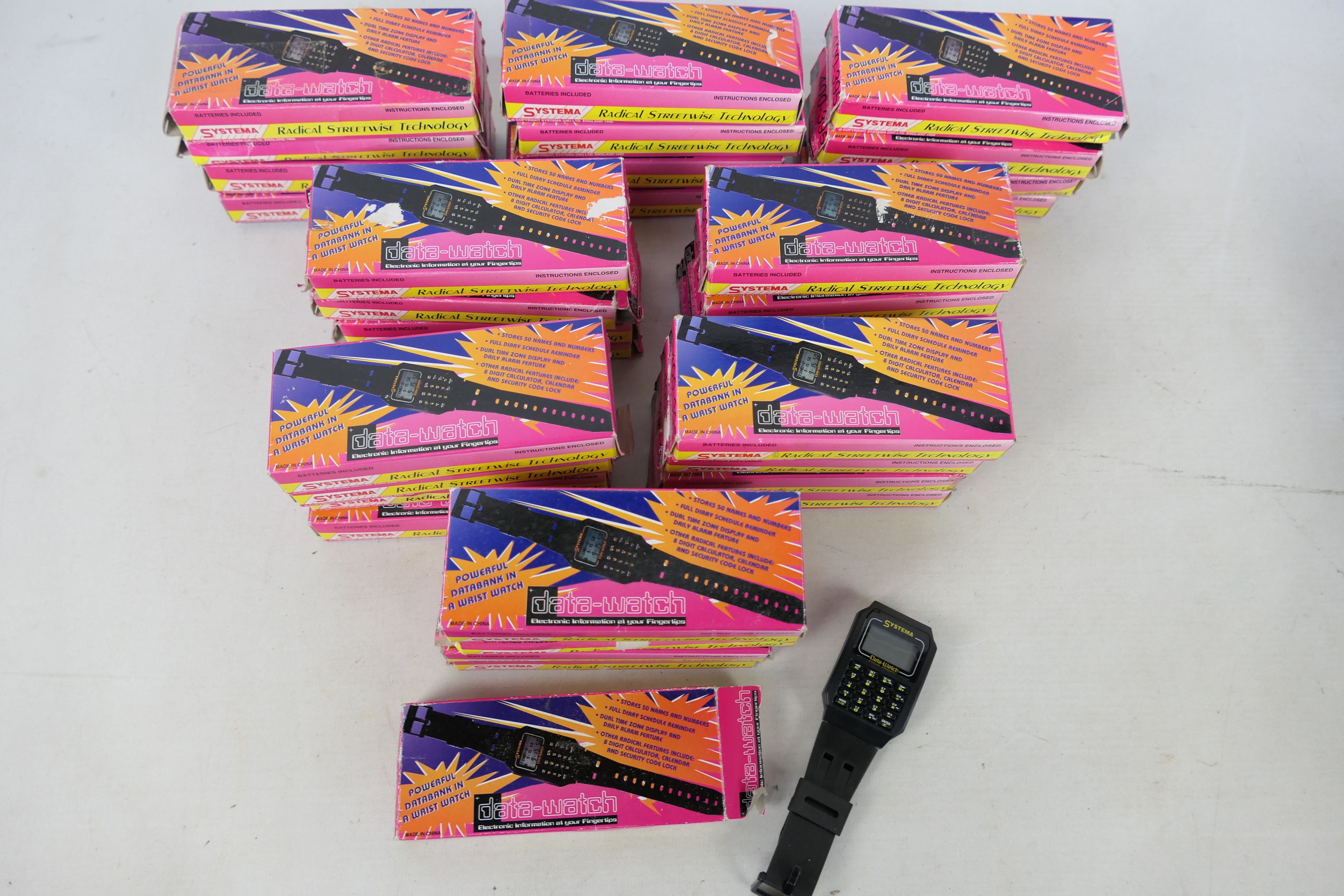 Systema - Unsold Shop Stock - 33 x boxed retro Electronic Data-watches from 1996.
