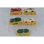 Dinky Toys - Four boxed Dinky Toys racing cars.