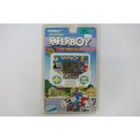 Tiger Electronics - An unopened 1990 Electronic Paperboy hand held game # 7-838.