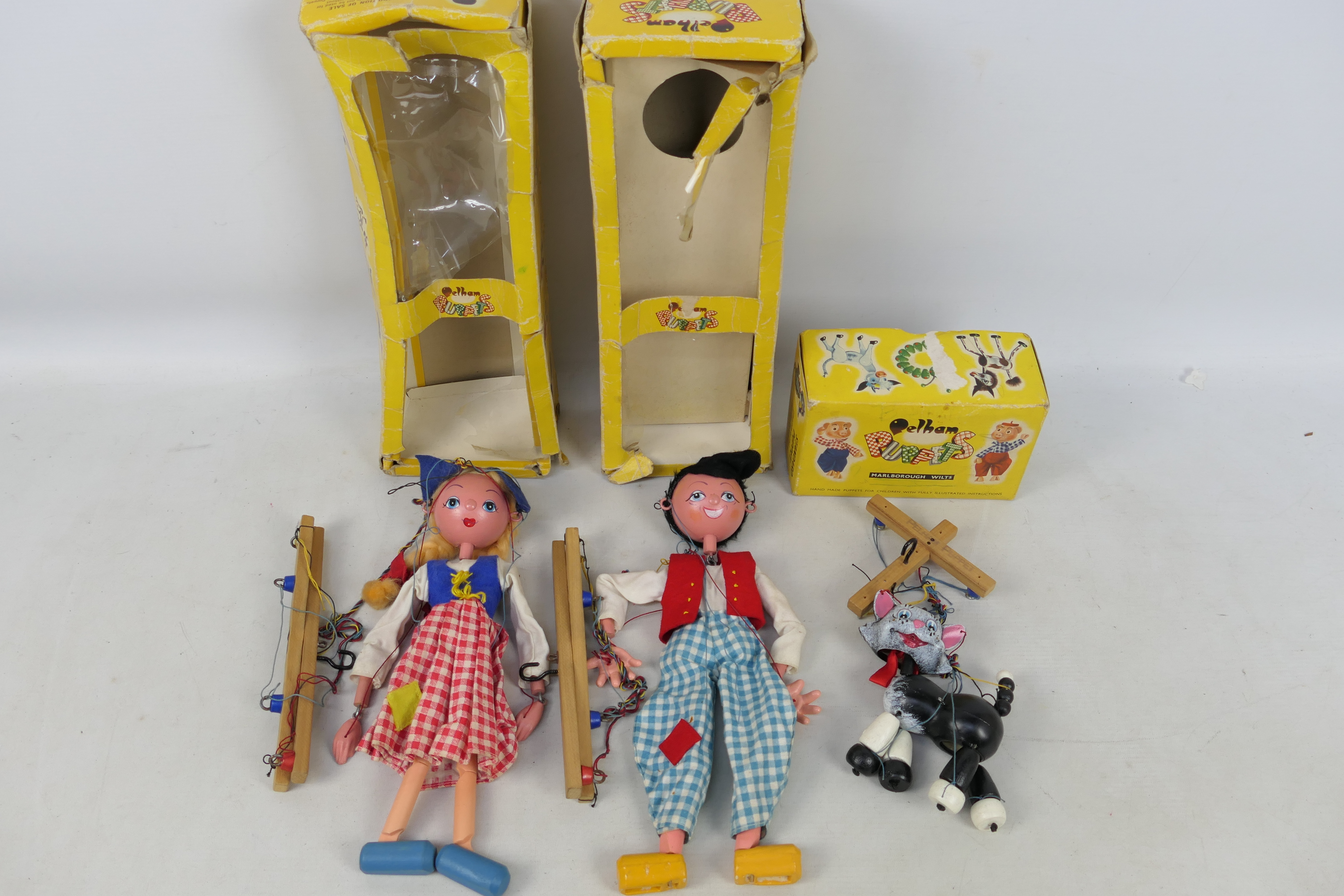 Pelham Puppets - 3 x boxed Pelham Puppets, Dutch Girl, Dutch Boy and Cat.