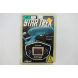 Konami - An unopened 1992 Electronic Star Trek hand held game. The item appears in Mint condition.