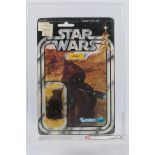 Kenner - Star Wars - Graded Figure - An AFA graded 1978 Kenner Jawa figure on card,