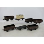 Bassett Lowke - A group of 7 x O gauge wagons including five LMS plank wagons,