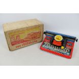 Mettype - A boxed Mettype Junior Toy Typewriter.