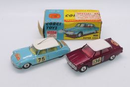 Corgi - 2 x Monte Carlo Rally models, an unboxed Citroen DS # 323 and a boxed Rover 2000 # 252.