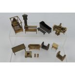 Unknown maker - An unboxed group of unmarked bronze dolls house furniture.