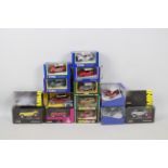 Corgi - Corgi Classics - A boxed collection of 13 1:43 scale diecast model Minis from various Corgi