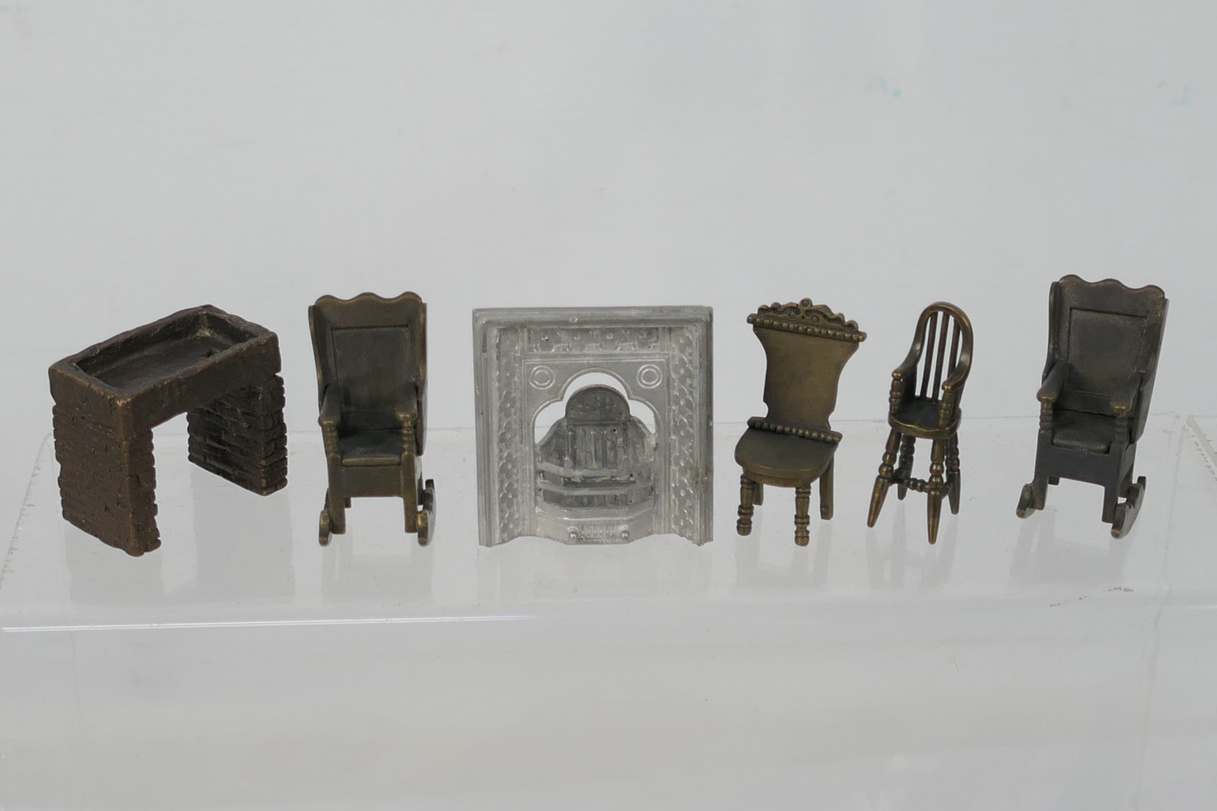 Unknown maker - An unboxed group of unmarked predominately bronze dolls house furniture. - Image 2 of 9